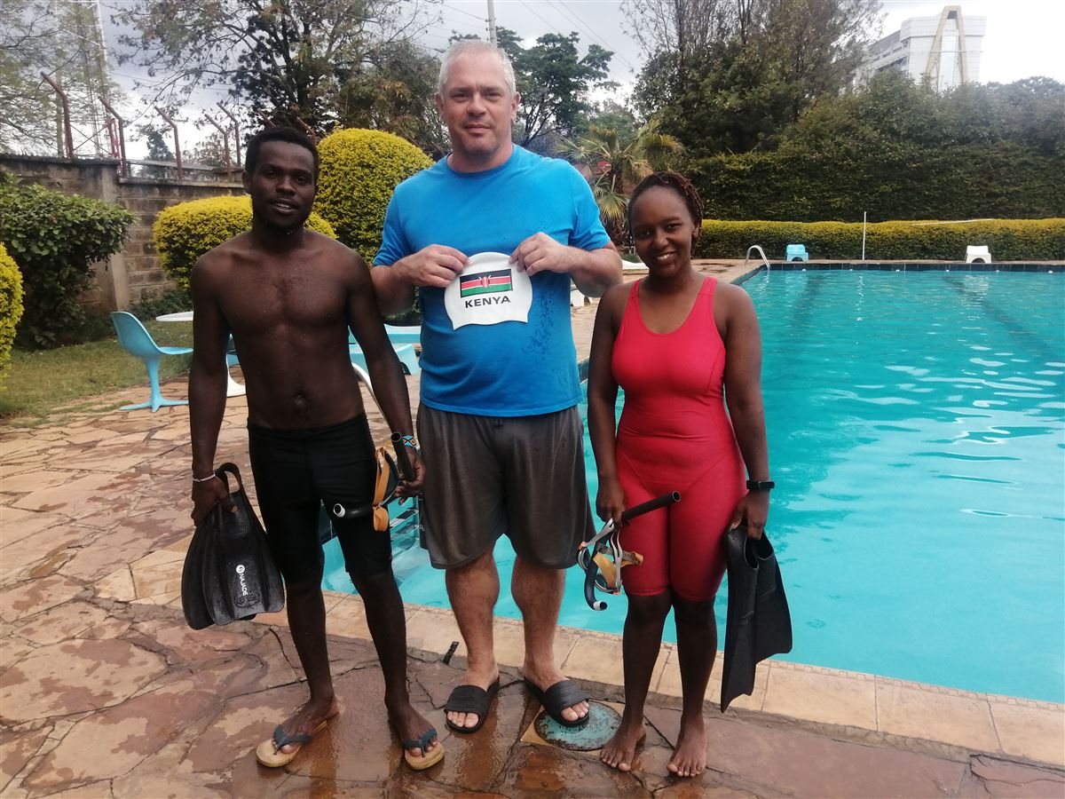 Coach with two Kenyan finswimmers